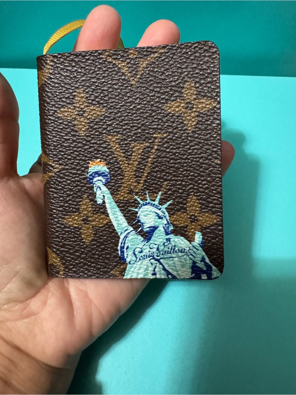 Louis Vuitton Brown Monogram Passport Cover with Blue-Cream Statue Motif - Picture 9 of 11